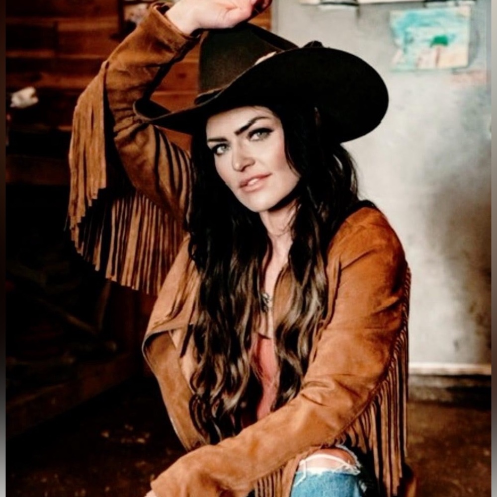 Ladies leather fringe jacket